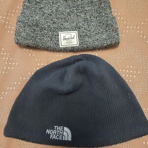 The North Face Black Beanie and Grey Herschel Beanie